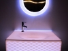 Decoración de baños retroiluminados con LED y fabricados con KRION
